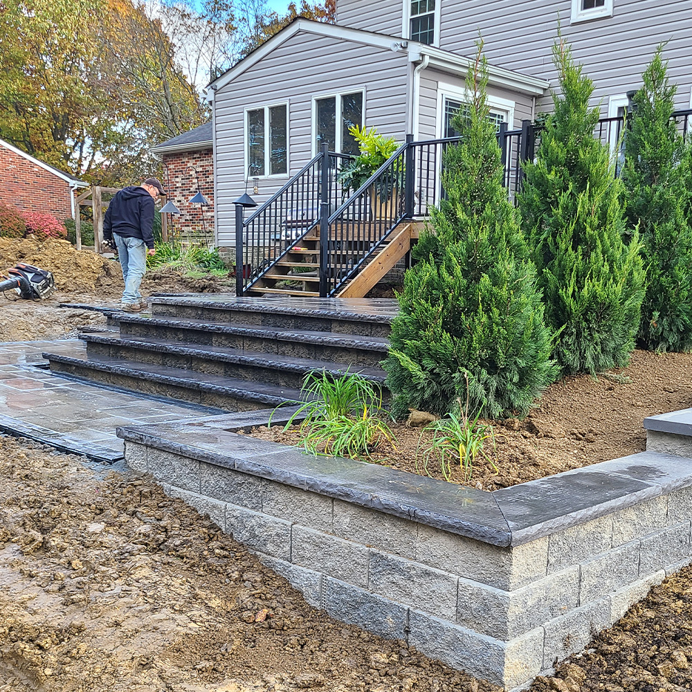 McGinn Hardscaping - Timber Retaining Wall