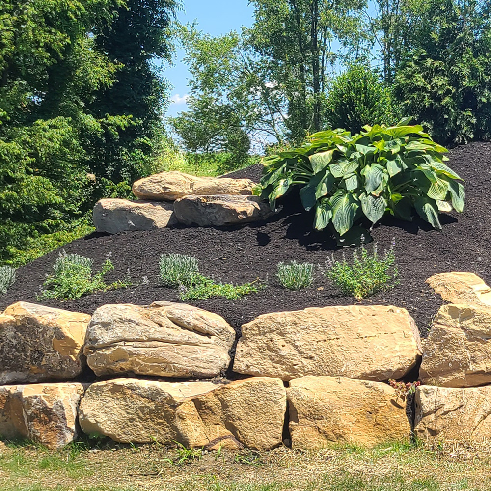 McGinn Hardscaping - Boulder Retaining Wall