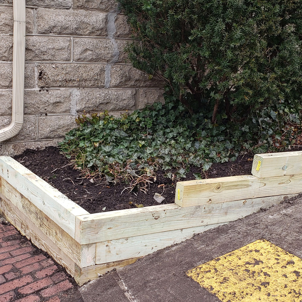 McGinn Hardscaping - Timber Retaining Wall