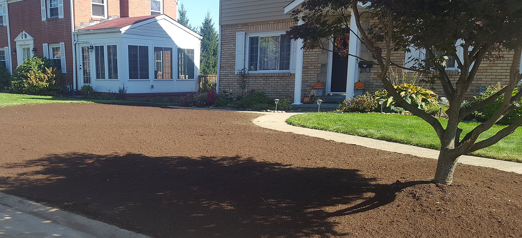 McGinn Hardscaping - Versa-Lok Black Walnut Retaining Wall