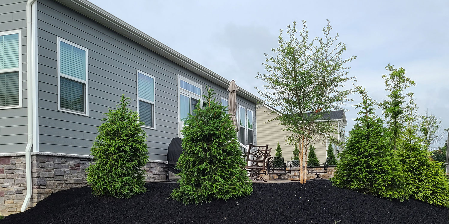 McGinn Hardscaping - Timber Retaining Wall